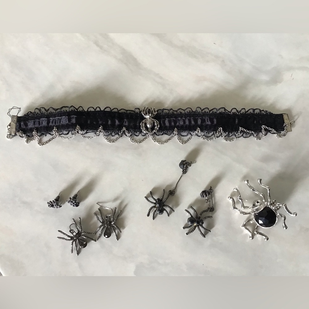 3 pair of spider earrings, ring, and choker necklace